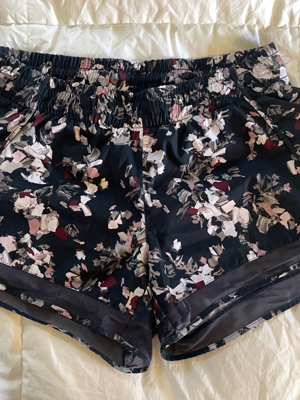 Athleta Navy Blue Floral-Patterned Athletic Shorts with Pink Accents Size Medium